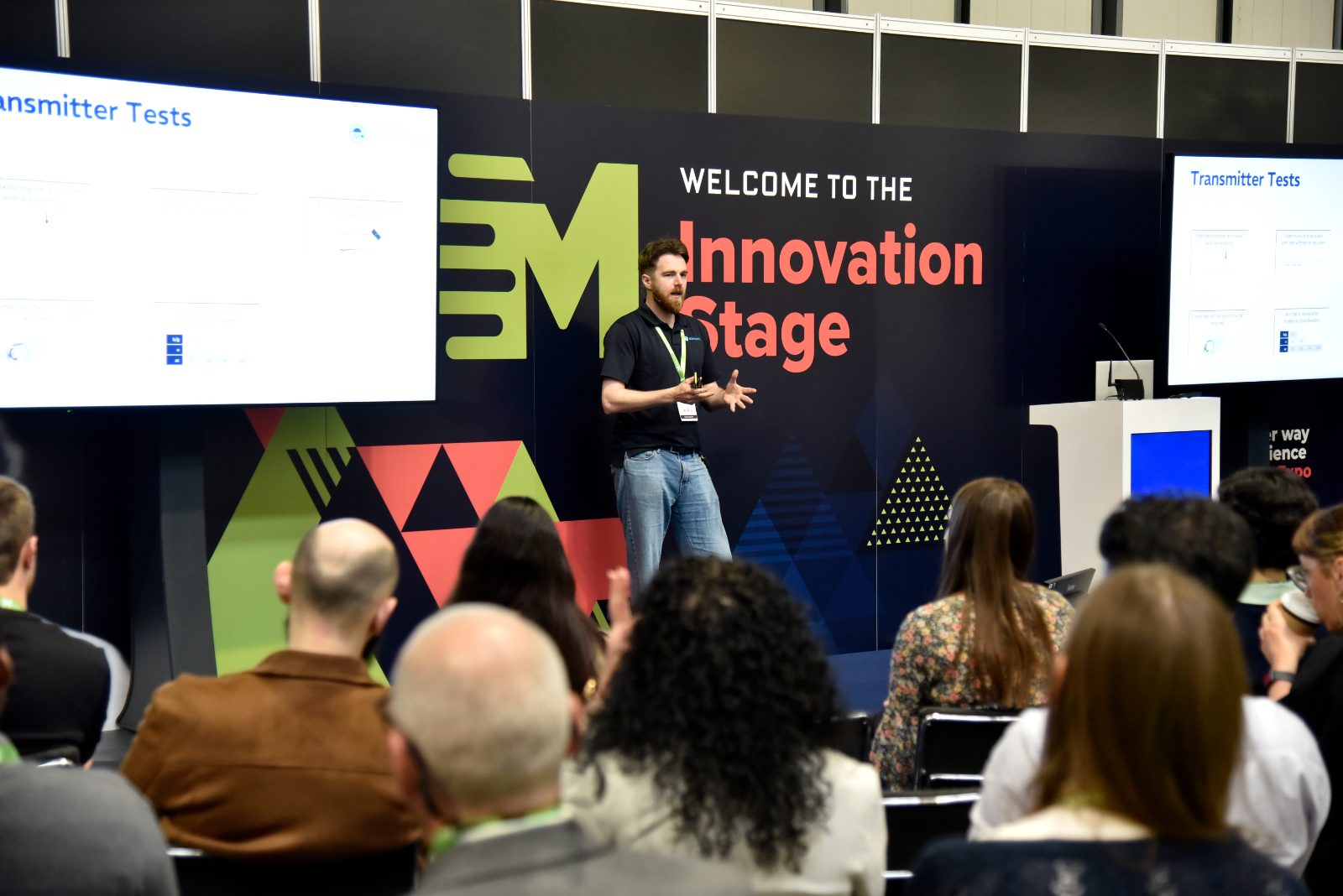 A speaker presenting on the Innovation Stage